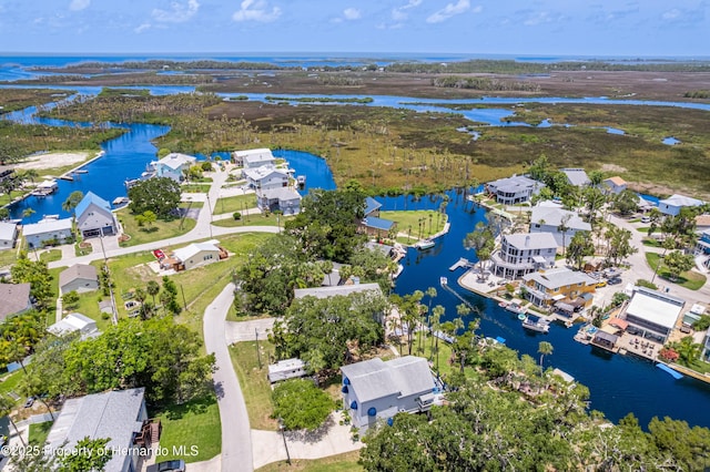 5233 Tuscawilla Dr, Weeki Wachee, FL 34607 - aerial view of residential area with a nearby body of water
