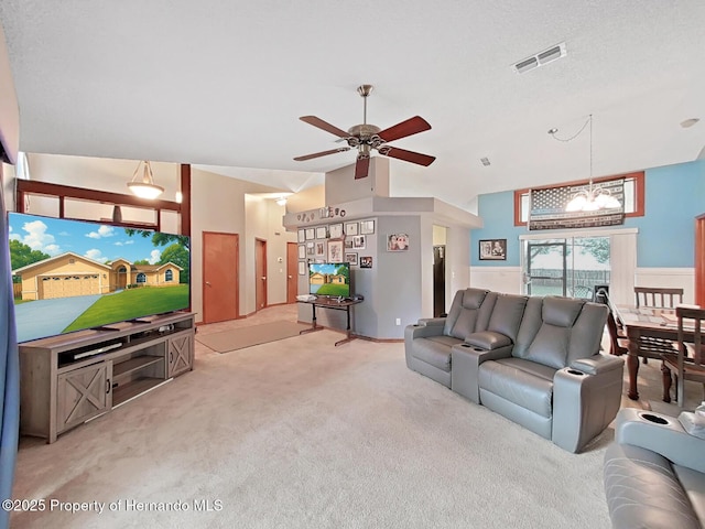 13094 Huntington Woods Ave, Spring Hill, FL 34609 - living area with a chandelier, light colored carpet, and a ceiling fan