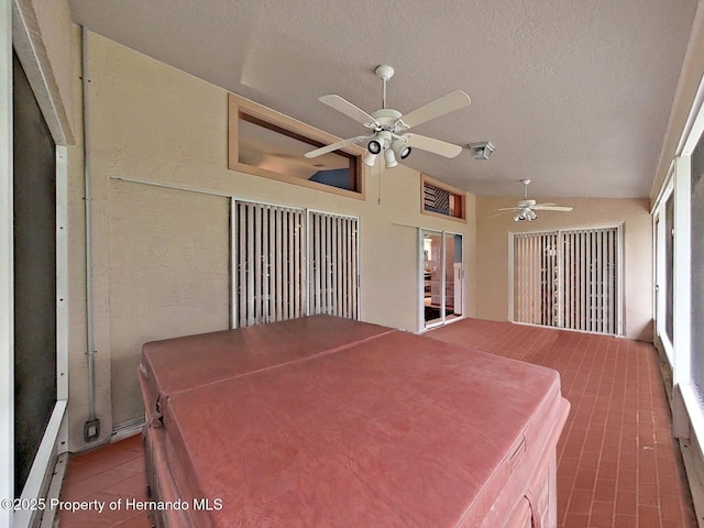 13094 Huntington Woods Ave, Spring Hill, FL 34609 - sunroom featuring a ceiling fan and vaulted ceiling