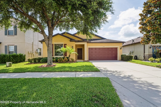 758 Alpine Thistle Dr, Brooksville, FL 34604 - ranch-style house with a garage, concrete driveway, a front yard, and stucco siding