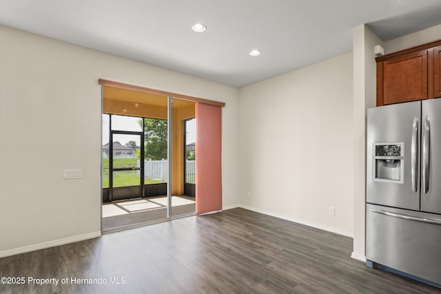 758 Alpine Thistle Dr, Brooksville, FL 34604 - spare room featuring dark wood finished floors and recessed lighting