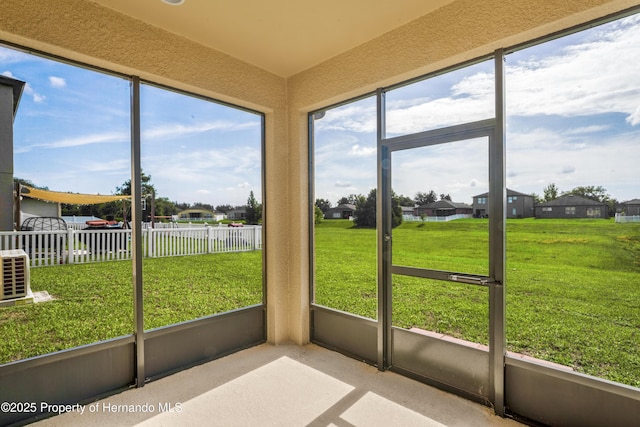 758 Alpine Thistle Dr, Brooksville, FL 34604 - unfurnished sunroom with a residential view