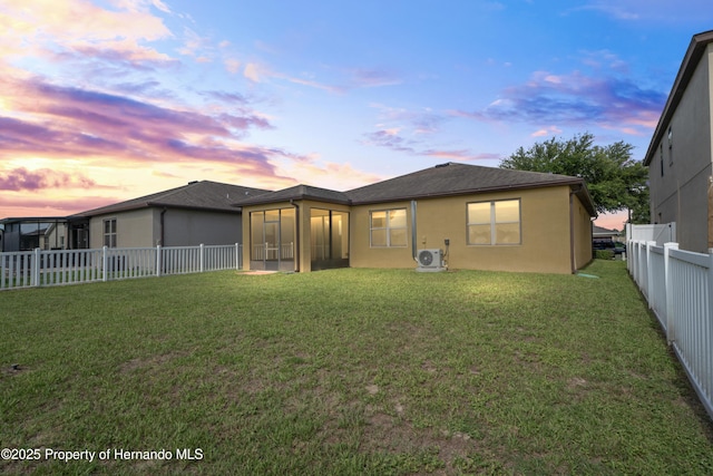758 Alpine Thistle Dr, Brooksville, FL 34604 - rear view of property with a fenced backyard, a sunroom, and stucco siding