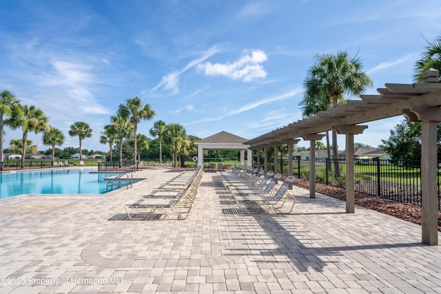 758 Alpine Thistle Dr, Brooksville, FL 34604 - community pool featuring a pergola, a gazebo, and a patio