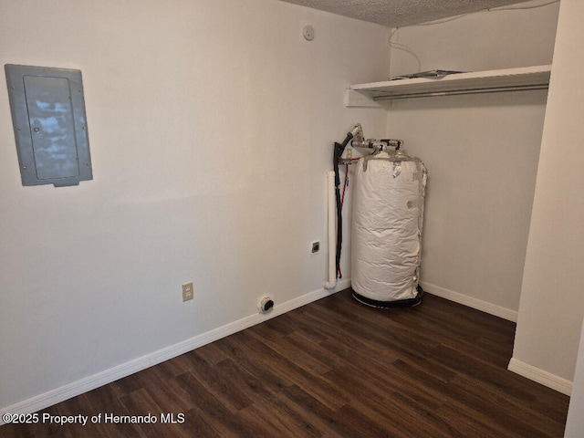 7344 California St, Brooksville, FL 34601 - laundry area with electric panel, wood finished floors, and hookup for an electric dryer