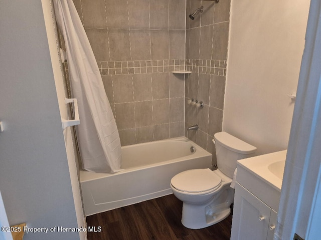 7344 California St, Brooksville, FL 34601 - full bath with shower / bathtub combination with curtain, wood finished floors, and vanity