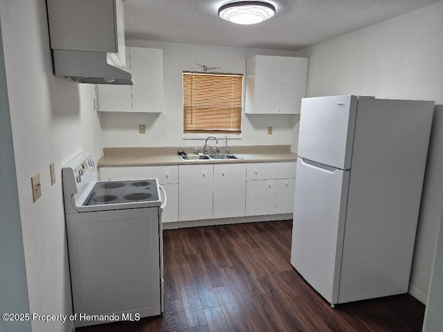 7344 California St, Brooksville, FL 34601 - kitchen featuring white appliances, dark wood-style flooring, white cabinets, and light countertops