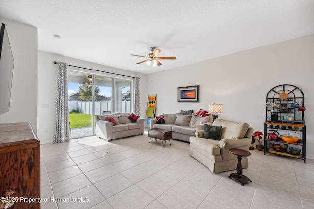 1098 Old Windsor Way, Spring Hill, FL 34609 - living room with ceiling fan and light tile patterned floors