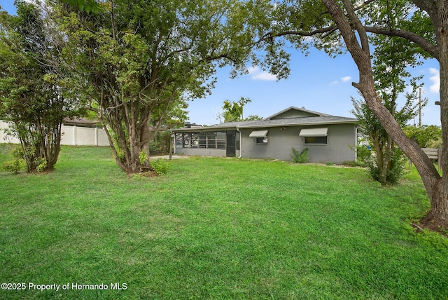 6310 Gainsboro Ave, Spring Hill, FL 34609 - view of yard featuring a sunroom