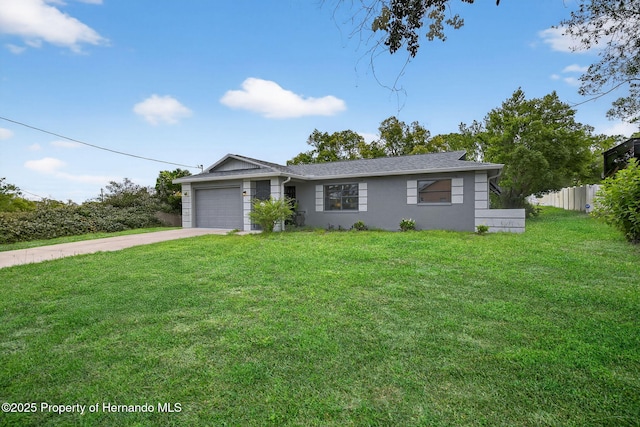 6310 Gainsboro Ave, Spring Hill, FL 34609 - view of front of property with concrete driveway, a garage, and stucco siding