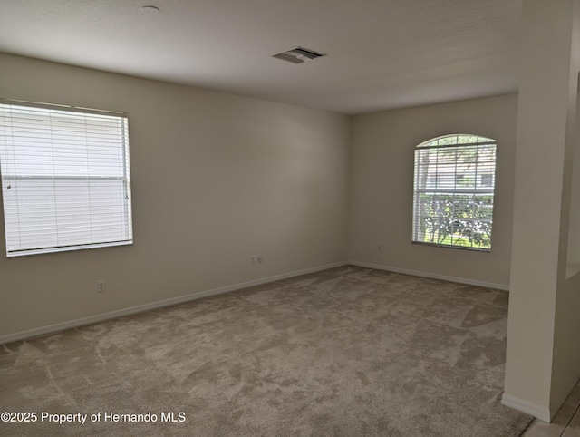 109 Fairmont Dr, Spring Hill, FL 34609 - carpeted spare room with baseboards