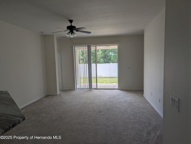 109 Fairmont Dr, Spring Hill, FL 34609 - carpeted empty room featuring ceiling fan and baseboards