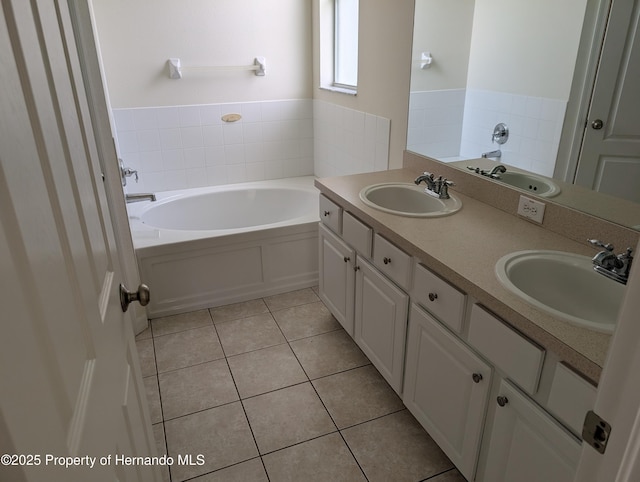 109 Fairmont Dr, Spring Hill, FL 34609 - bathroom featuring a bath, tile patterned flooring, and double vanity