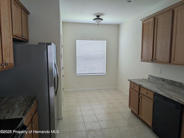 109 Fairmont Dr, Spring Hill, FL 34609 - kitchen featuring freestanding refrigerator, dishwasher, stone counters, and brown cabinets