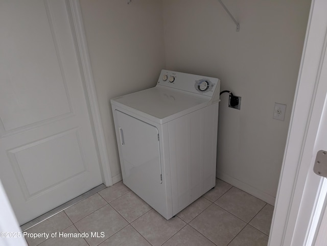 109 Fairmont Dr, Spring Hill, FL 34609 - laundry room with washer / dryer and light tile patterned floors