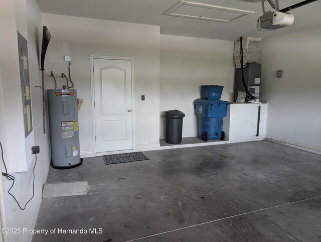109 Fairmont Dr, Spring Hill, FL 34609 - garage with electric water heater, a garage door opener, and heating unit
