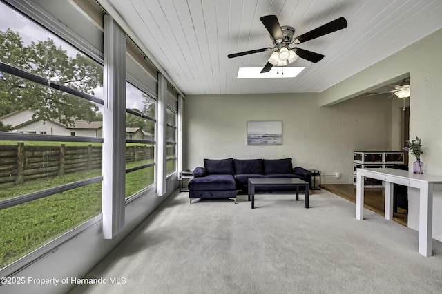 7385 Crestwood Dr, Weeki Wachee, FL 34613 - sunroom / solarium with outdoor lounge area, ceiling fan, and a skylight