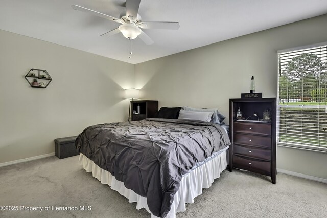 7385 Crestwood Dr, Weeki Wachee, FL 34613 - bedroom featuring carpet floors and ceiling fan