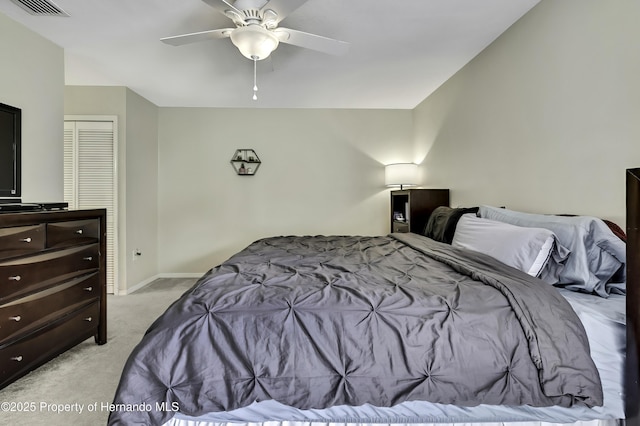 7385 Crestwood Dr, Weeki Wachee, FL 34613 - bedroom featuring light carpet and ceiling fan