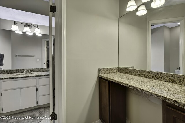 7385 Crestwood Dr, Weeki Wachee, FL 34613 - bathroom with vanity and toilet