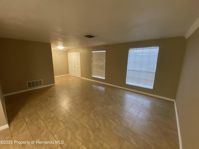 1392 Piper Rd, Spring Hill, FL 34606 - spare room with baseboards