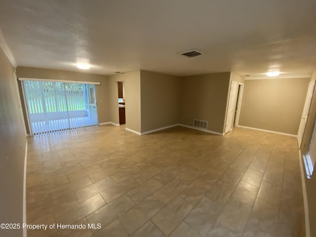 1392 Piper Rd, Spring Hill, FL 34606 - unfurnished room featuring baseboards
