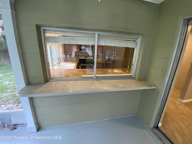 1392 Piper Rd, Spring Hill, FL 34606 - detailed view of a sink and electric stove
