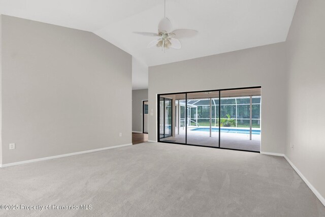 13125 Jessica Dr, Spring Hill, FL 34609 - carpeted spare room featuring ceiling fan and high vaulted ceiling