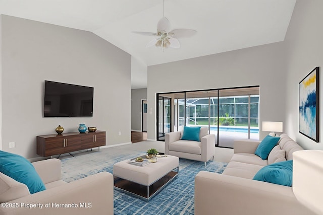 13125 Jessica Dr, Spring Hill, FL 34609 - carpeted living area featuring a ceiling fan and high vaulted ceiling
