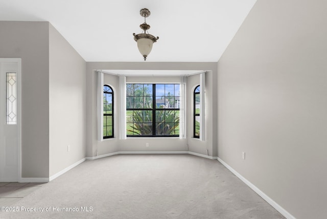 13125 Jessica Dr, Spring Hill, FL 34609 - carpeted empty room with baseboards