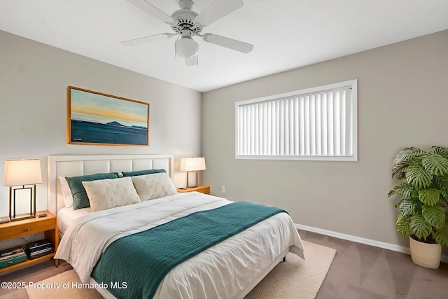 13125 Jessica Dr, Spring Hill, FL 34609 - bedroom with baseboards and a ceiling fan