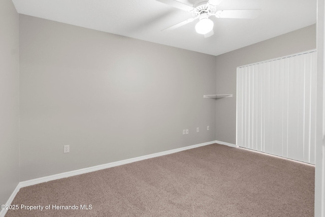 13125 Jessica Dr, Spring Hill, FL 34609 - carpeted empty room featuring ceiling fan and baseboards