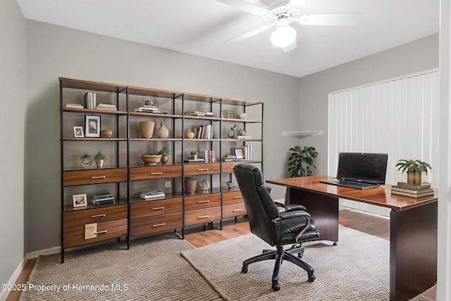 13125 Jessica Dr, Spring Hill, FL 34609 - office area featuring ceiling fan and wood finished floors