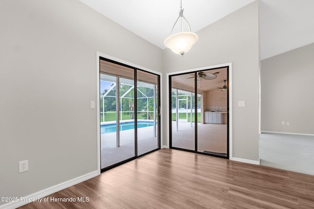 13125 Jessica Dr, Spring Hill, FL 34609 - spare room with wood finished floors and a ceiling fan