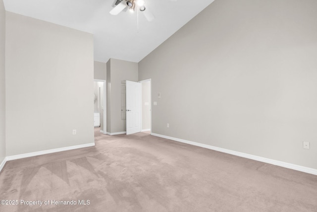 13125 Jessica Dr, Spring Hill, FL 34609 - spare room with carpet flooring, high vaulted ceiling, and ceiling fan