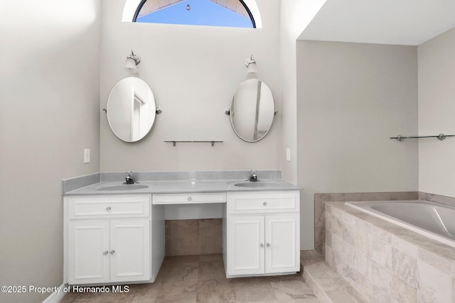 13125 Jessica Dr, Spring Hill, FL 34609 - full bathroom featuring double vanity and a garden tub