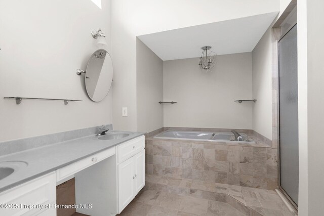13125 Jessica Dr, Spring Hill, FL 34609 - full bath with a garden tub and double vanity