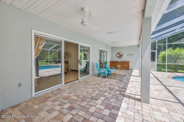 4276 River Birch Dr, Spring Hill, FL 34607 - view of patio / terrace with ceiling fan, glass enclosure, and an outdoor pool