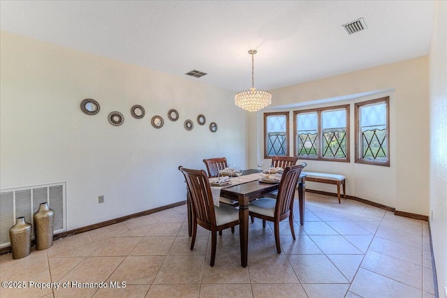 4276 River Birch Dr, Spring Hill, FL 34607 - dining room featuring a chandelier and light tile patterned floors
