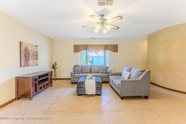 4276 River Birch Dr, Spring Hill, FL 34607 - living room with ceiling fan and light tile patterned floors
