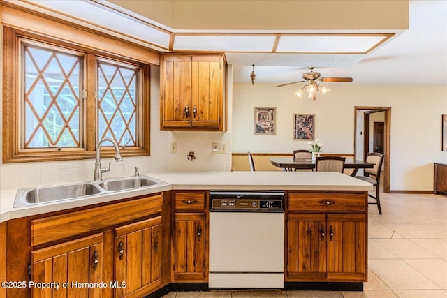 4276 River Birch Dr, Spring Hill, FL 34607 - kitchen featuring dishwasher, a peninsula, ceiling fan, and light countertops