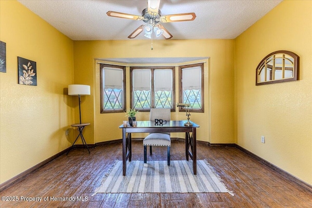 4276 River Birch Dr, Spring Hill, FL 34607 - office featuring a textured ceiling, wood finished floors, and ceiling fan