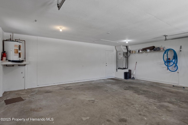 8410 Lakehill Ct, Spring Hill, FL 34608 - garage with electric water heater and heating unit