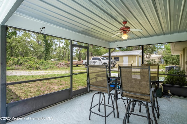 13345 Convent Garden Rd, Brooksville, FL 34613 - sunroom / solarium with a ceiling fan and outdoor dining space