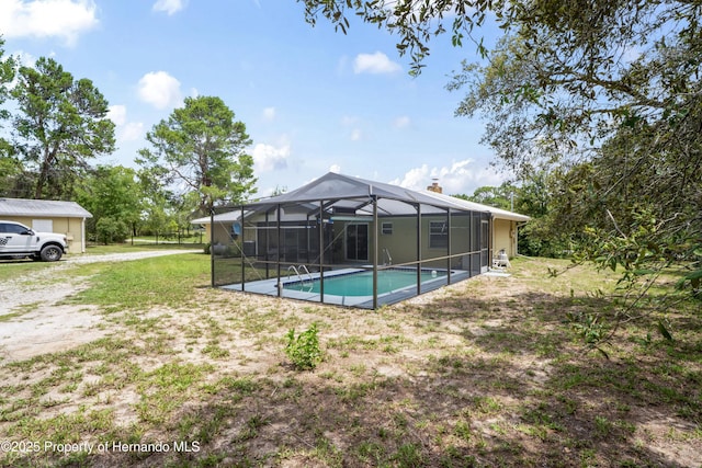 13345 Convent Garden Rd, Brooksville, FL 34613 - swimming pool featuring a yard and a lanai