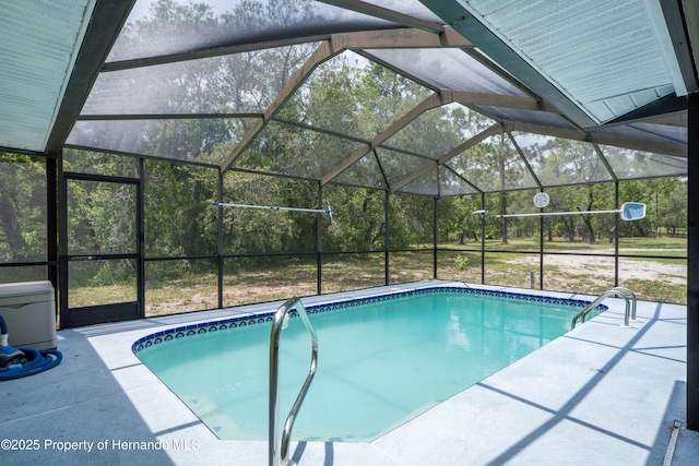 13345 Convent Garden Rd, Brooksville, FL 34613 - outdoor pool with glass enclosure and a patio area