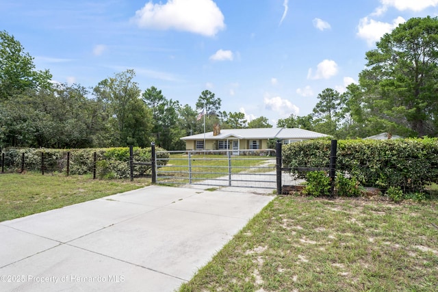 13345 Convent Garden Rd, Brooksville, FL 34613 - fenced yard with a gate and driveway