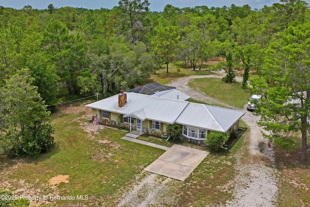 13345 Convent Garden Rd, Brooksville, FL 34613 - view from above of property with a heavily wooded area