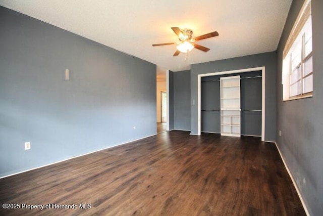 6275 Casson St, Brooksville, FL 34604 - unfurnished bedroom featuring dark wood-style flooring, a closet, and ceiling fan