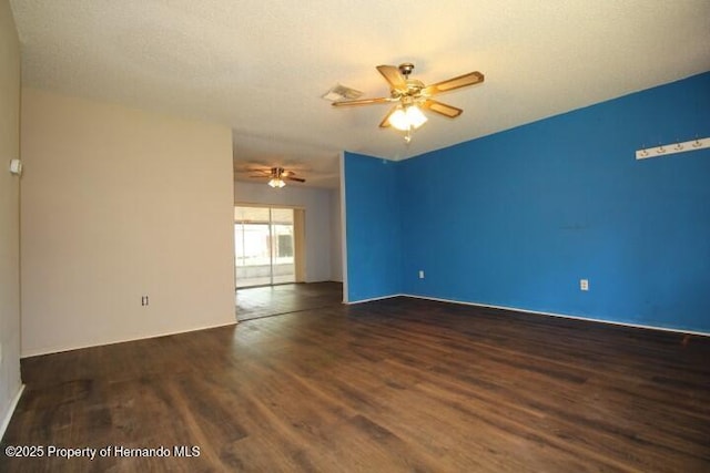 6275 Casson St, Brooksville, FL 34604 - empty room with wood finished floors and a ceiling fan